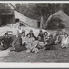 Resting after dinner following a corn shucking on Hoopers' farm in Corbett Ridge section. Caswell County, North Carolina.