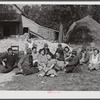 Resting after dinner following a corn shucking on Hoopers' farm in Corbett Ridge section. Caswell County, North Carolina.