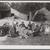 Resting after dinner following a corn shucking on Hoopers' farm in Corbett Ridge section. Caswell County, North Carolina.
