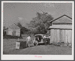 Peddler who come to tobacco farm on Emery Hooper's farm to sell them some meat. Corbett Ridge section near Prospect Hill. Caswell County, North Carolina.