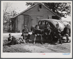 Resting after dinner following a corn shucking on Hooper Farm in Corbett Ridge section. Caswell County, North Carolina.