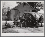 Resting after dinner following a corn shucking on Hooper Farm in Corbett Ridge section. Caswell County, North Carolina.