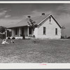 The W.H. Willis' home which they built themselves with a tenant purchase loan and the ground improvement and planting and landscaping they did on a work grant. Near Yanceyville, Caswell County, North Carolina.