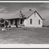 The W.H. Willis' home which they built themselves with a tenant purchase loan and the ground improvement and planting and landscaping they did on a work grant. Near Yanceyville, Caswell County, North Carolina.