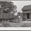 In the fall of the year after the crops are up many tenants and share croppers move into another farm. This Black family was moving from this home near Yanceyville to one near Raleigh, North Carolina. Caswell County, North Carolina.