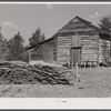 Sticks used in stripping tobacco in front of strip house on Emery Hooper's farm in Corbett Ridge section near Prospect Hill. Caswell County, North Carolina.