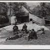 Farmers who have just finished shucking corn resting after large dinner on Hooper's farm near Hightowers and Prospect Hill. Caswell County, North Carolina.