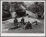 Farmers who have just finished shucking corn resting after large dinner on Hooper's farm near Hightowers and Prospect Hill. Caswell County, North Carolina.