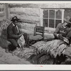 E.O Foster, FSA (Farm Security Administration) tenant purchase borrower grading and stripping his tobacco. Caswell County, North Carolina.