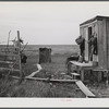 Muskrat skins hanging up to dry by Spanish trapper's home in the marshes. He then takes the furs to the island to sell. Delacroix Island, Saint Bernard Parish, Louisiana.