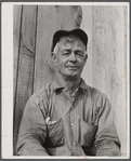 Spanish muskrat trapper by his camp in the marshes. Delacroix Island, Saint Bernard Parish, Louisiana.