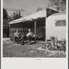 Guests at the Sarasota trailer park outside their trailer homes. Sarasota, Florida.