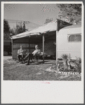 Guests at the Sarasota trailer park outside their trailer homes. Sarasota, Florida.