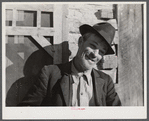 Noah Garland sitting on the steps of his son's home. Southern Appalachian Project near Barbourville, Knox County, Kentucky.