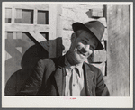 Noah Garland sitting on the steps of his son's home. Southern Appalachian Project near Barbourville, Knox County, Kentucky.