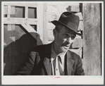 Noah Garland sitting on the steps of his son's home. Southern Appalachian Project near Barbourville, Knox County, Kentucky.