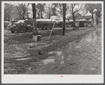 Jones Trailer Camp where army men and construction workers and their families live. They pay two dollars and fifty cents weekly for space only. One said "It's nothing but a mud hole, only running water, you can't find a decent place to live in Columbus, and nobody will allow children in their homes--it's a shame. We was all children once. Most folks got children.".