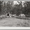 Mrs. M.C. Ray from Mangum, Louisiana. Wife of construction worker at Camp Livingston who had been farming but came out here to make more money. The whole family has had flu. When they first arrived they had to sell their car so they can't get to Alexandria too often to get milk for the children and other supplies. She said that all her grocery bills here were twice as much for the same amount of food as they were in Mangum and the eggs were also at least twice as high.