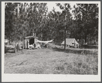 Mrs. M.C. Ray from Mangum, Louisiana. Wife of construction worker at Camp Livingston who had been farming but came out here to make more money. The whole family has had flu. When they first arrived they had to sell their car so they can't get to Alexandria too often to get milk for the children and other supplies. She said that all her grocery bills here were twice as much for the same amount of food as they were in Mangum and the eggs were also at least twice as high.