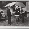 Travelling preacher, Reverend C.L. Bullard, with Jonathan Daniels and construction workers from Monroe, Louisiana. Alexandria, Louisiana.