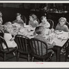 Children of migratory workers eating lunch in twenty-four hour nursery at Osceola migratory labor camp built by FSA (Farm Security Administration). Belle Glade, Florida.