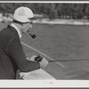 Guest of Sarasota trailer park, Sarasota, Florida, fishing from bridge.
