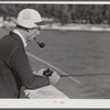 Guest of Sarasota trailer park, Sarasota, Florida, fishing from bridge.