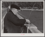 Guest of Sarasota trailer park, Sarasota, Florida, with fish bait, fishing from bridge.