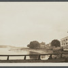 View of west shore of Greenport Harbor, showing wharfs and Shelter Island in the distance. Greenport, Southold