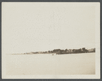 View of Greenport Harbor, showing railroad wharf and houses along shore. Greenport, Southold