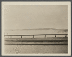 View from Steamboat Wharf of Greenport Harbor, showing Shelter Island in the distance. Greenport, Southold