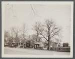 House on the left owned by Jeremiah Mulford (1858), center house owned by Laura Halleck (1924), house on right owned by Gwen Bennett (1924) and a gift shop. East side of Main St., south of David's Lane. East Hampton, East Hampton