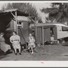 Sitting outside trailer in Sarasota trailer park. Sarasota, Florida.