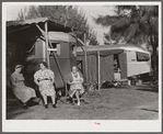 Sitting outside trailer in Sarasota trailer park. Sarasota, Florida.
