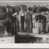 Guests of Sarasota trailer park, Sarasota, Florida, with fish they had just caught.