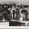 Guests of Sarasota trailer park, Sarasota, Florida, with fish they had just caught.