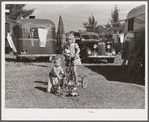 Children playing outside their trailer home at Sarasota trailer park. Sarasota, Florida.