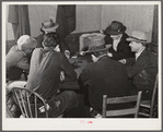 Muskrat trappers playing "cache," a form of poker, in a bar after a fur sale. Delacroix Island, Saint Bernard Parish, Louisiana.