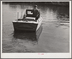 FSA (Farm Security Administration) supervisor going out in the bayous and marshes to visit some of the muskrat trappers at their canps. Near Delacroix Island, Louisiana.