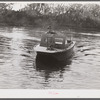 Weldon P. Smith, FSA (Farm Security Administration) supervisor, going out to the bayous and marshes to visit some of the muskrat trappers at their camps. Near Delacroix Island, Louisiana. See general caption number one.