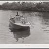 Weldon P. Smith, FSA (Farm Security Administration) supervisor, going out to the bayous and marshes to visit some of the muskrat trappers at their camps. Near Delacroix Island, Louisiana. See general caption number one.
