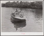 Weldon P. Smith, FSA (Farm Security Administration) supervisor, going out to the bayous and marshes to visit some of the muskrat trappers at their camps. Near Delacroix Island, Louisiana. See general caption number one.