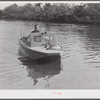 Weldon P. Smith, FSA (Farm Security Administration) supervisor, going out to the bayous and marshes to visit some of the muskrat trappers at their camps. Near Delacroix Island, Louisiana. See general caption number one.