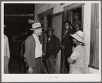 John Kirk maintaining the law and checking up on Saturday night in the Black quarter of Belle Glade, Florida