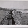 Freight train going west from Minot, North Dakota, across the plains.