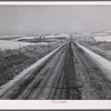 Highway through wheat ranches near Williston, North Dakota.