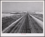 Highway through wheat ranches near Williston, North Dakota.