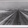 Highway through wheat ranches near Williston, North Dakota.