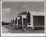 Metal shelters for agricultural works. Osceola migratory labor camp. Belle Glade, Florida.
