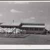 Utility building at Osceola migratory labor camp. Belle Glade, Florida.